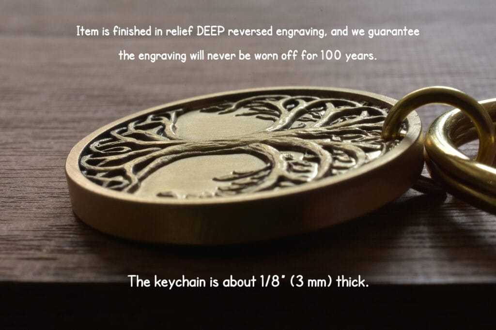Gold keychain with a deep relief tree engraving, guaranteed to remain intact for 100 years. 1/8 thick.