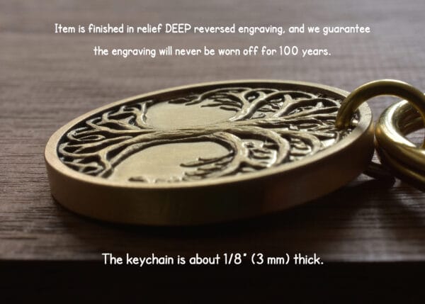 Gold keychain with a deep relief tree engraving, guaranteed to remain intact for 100 years. 1/8 thick.